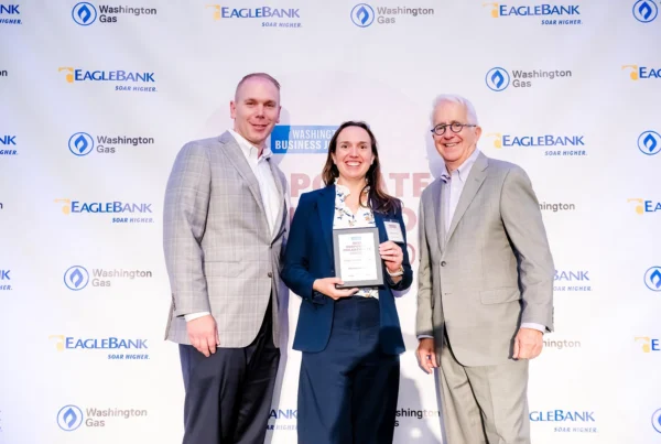 Jason Greenawalt and Kaitlin Ekechuku accepting the Washington Business Journal Corporate Philanthropy Award on behalf of Nakupuna